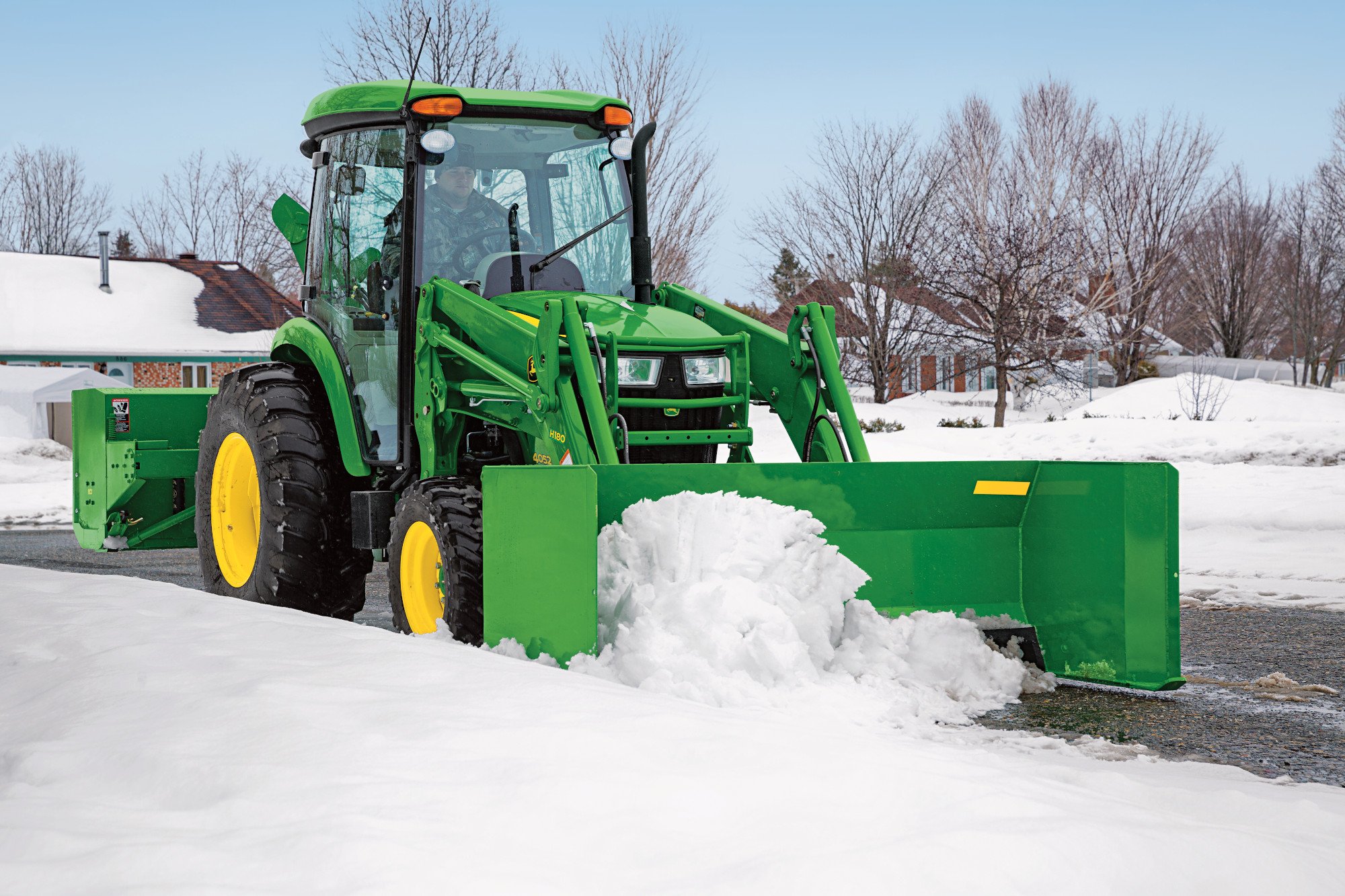 John Deere Compact Tractor with Frontier Snow pusher